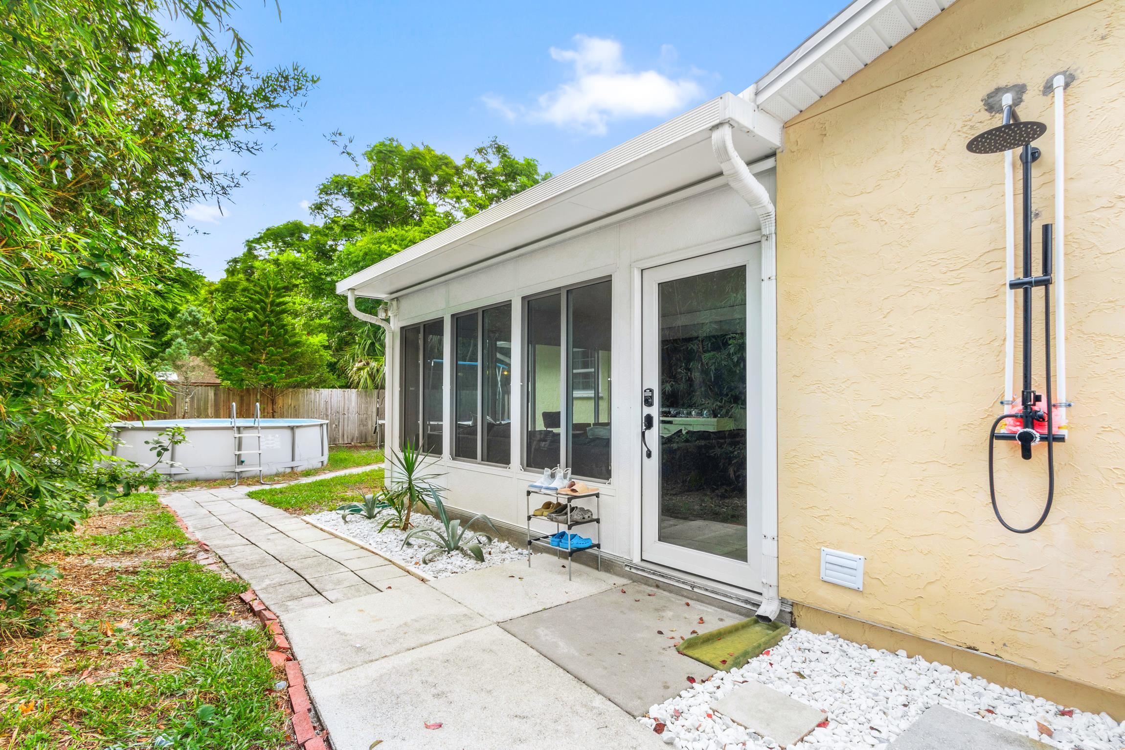 359 Shamrock Road St. Augustine, FL 32086 - Photo 23 of 39 a house with swimming pool in front of it
