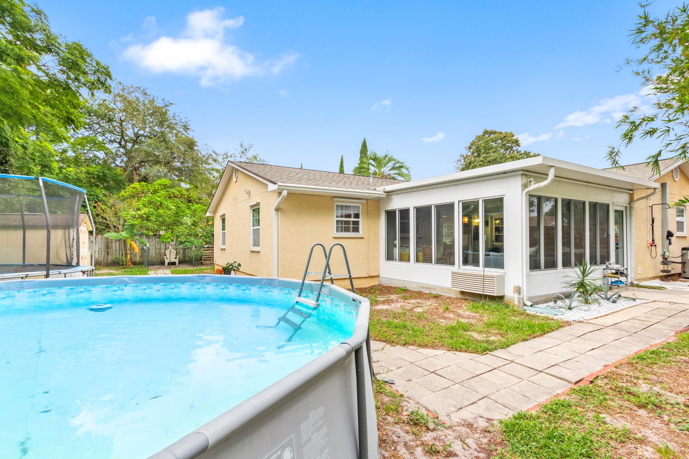 359 Shamrock Road St. Augustine, FL 32086 - Photo 25 of 39 a view of a house with backyard and sitting area