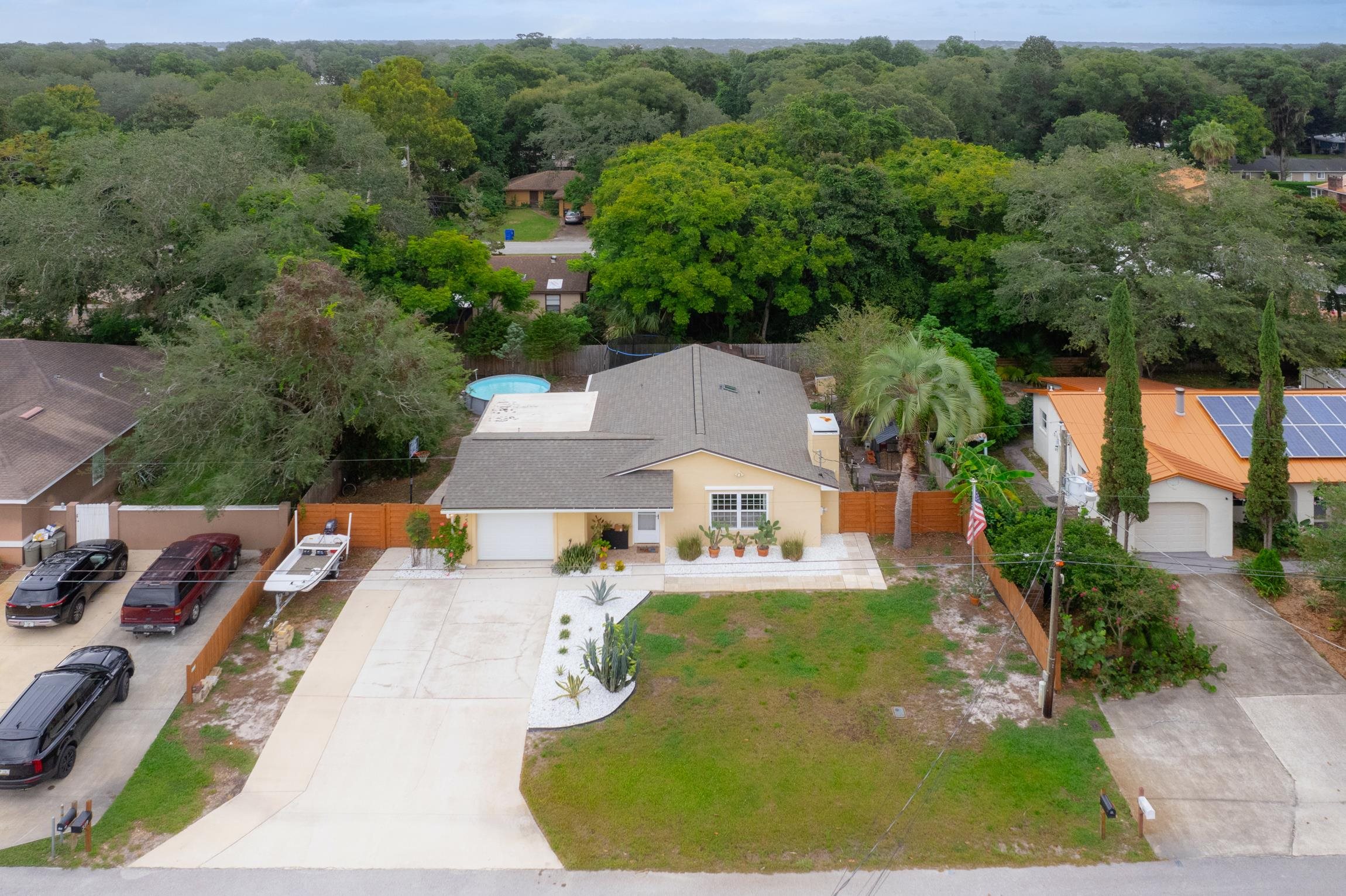 359 Shamrock Road St. Augustine, FL 32086 - Photo 31 of 39 an aerial view of a house with pool outdoor seating and yard