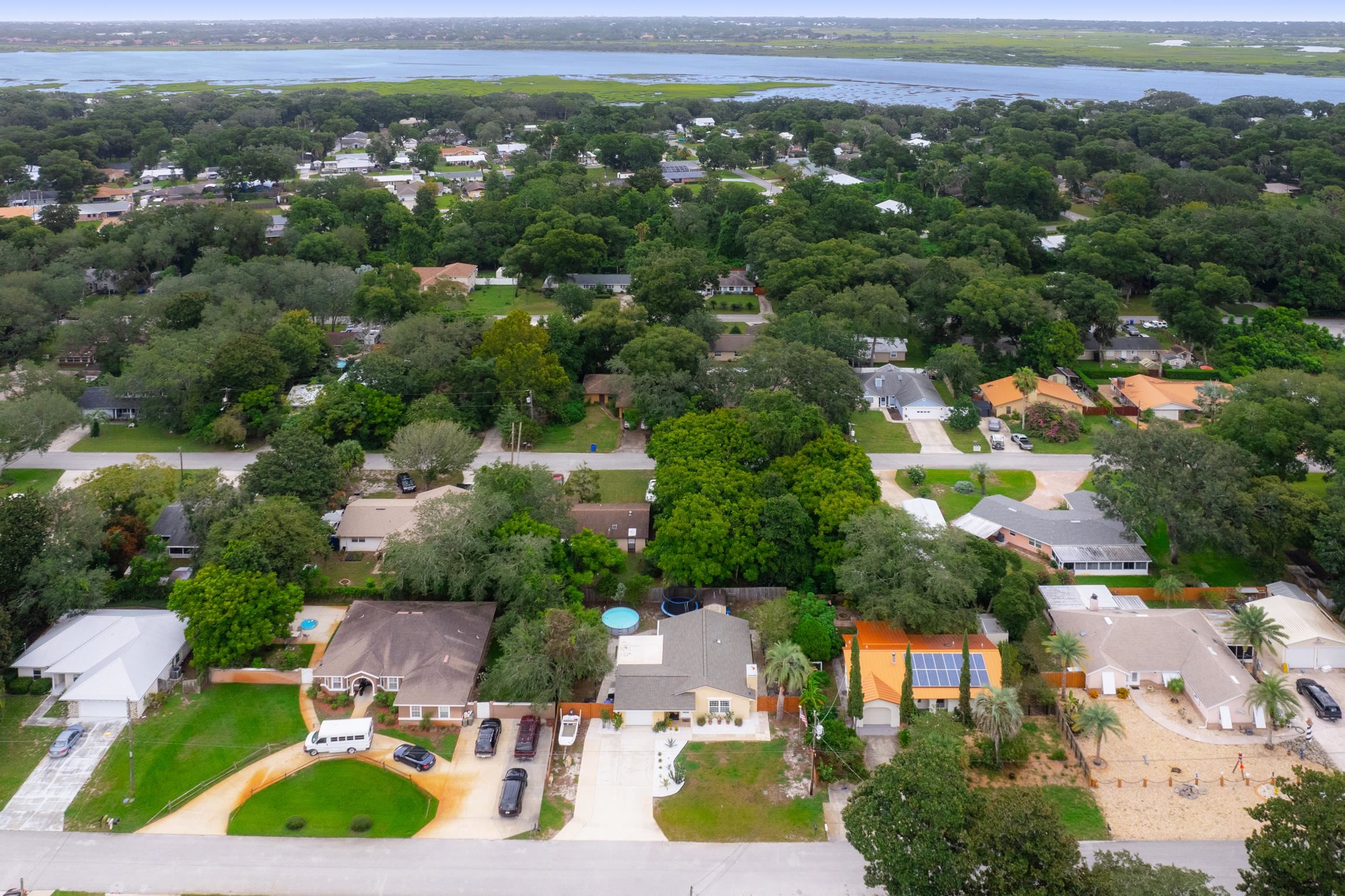 359 Shamrock Road St. Augustine, FL 32086 - Photo 33 of 39 an aerial view of residential houses with outdoor space and street view
