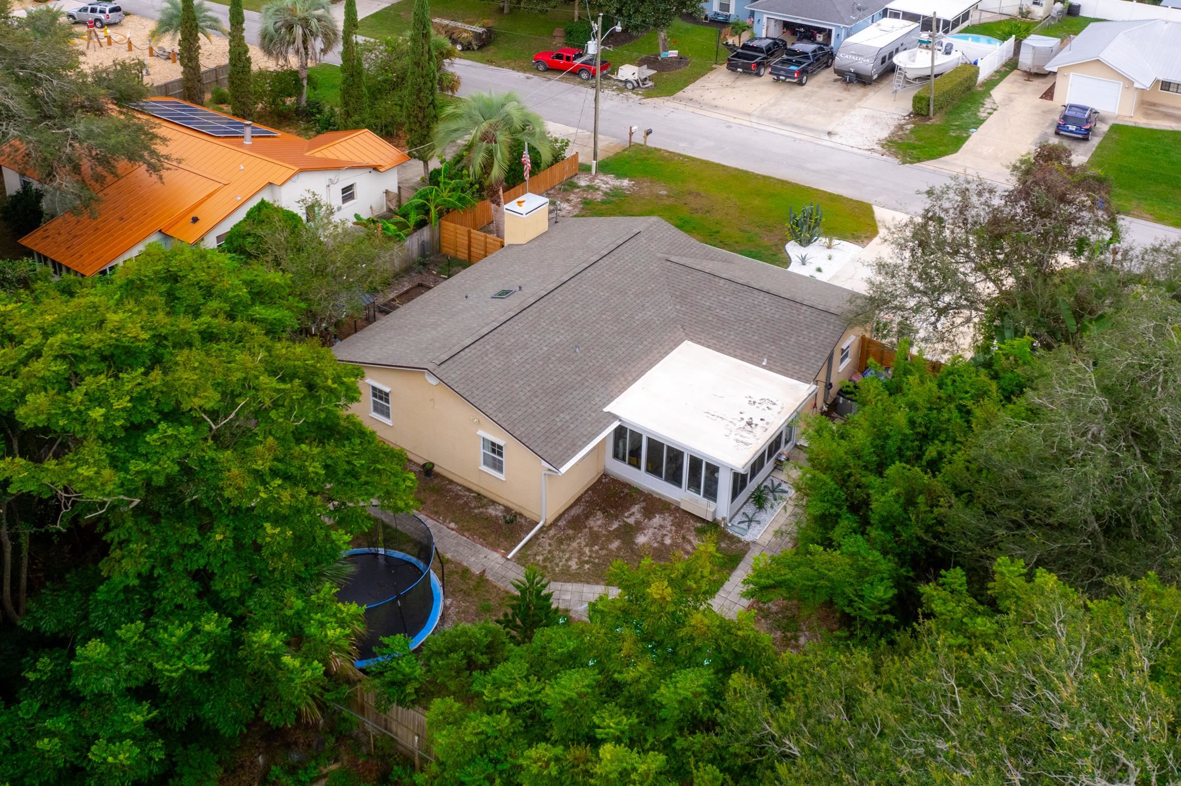 359 Shamrock Road St. Augustine, FL 32086 - Photo 37 of 39 an aerial view of a house with a yard and lake view