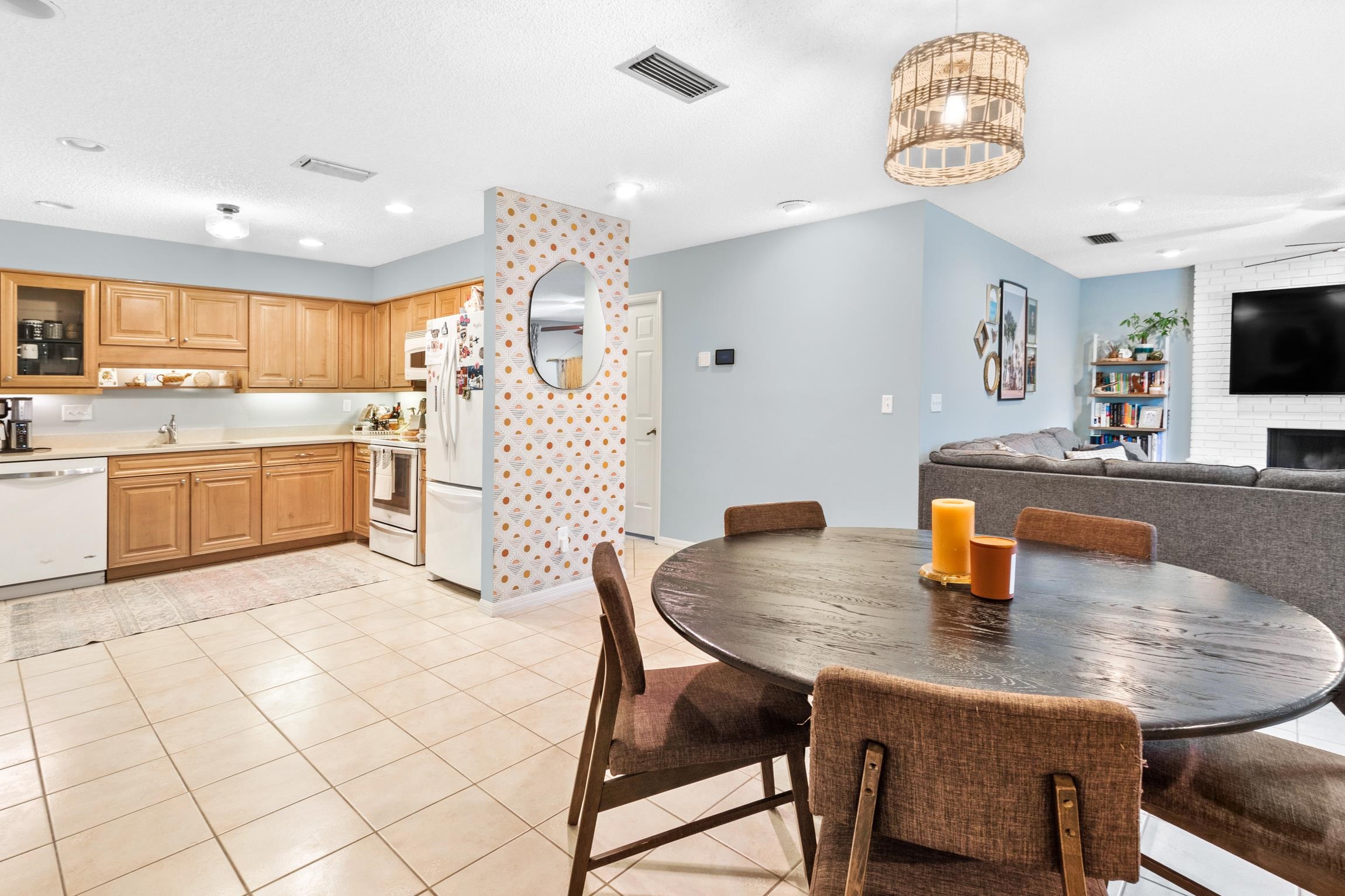 359 Shamrock Road St. Augustine, FL 32086 - Photo 10 of 39 a kitchen with sink cabinets and dining table