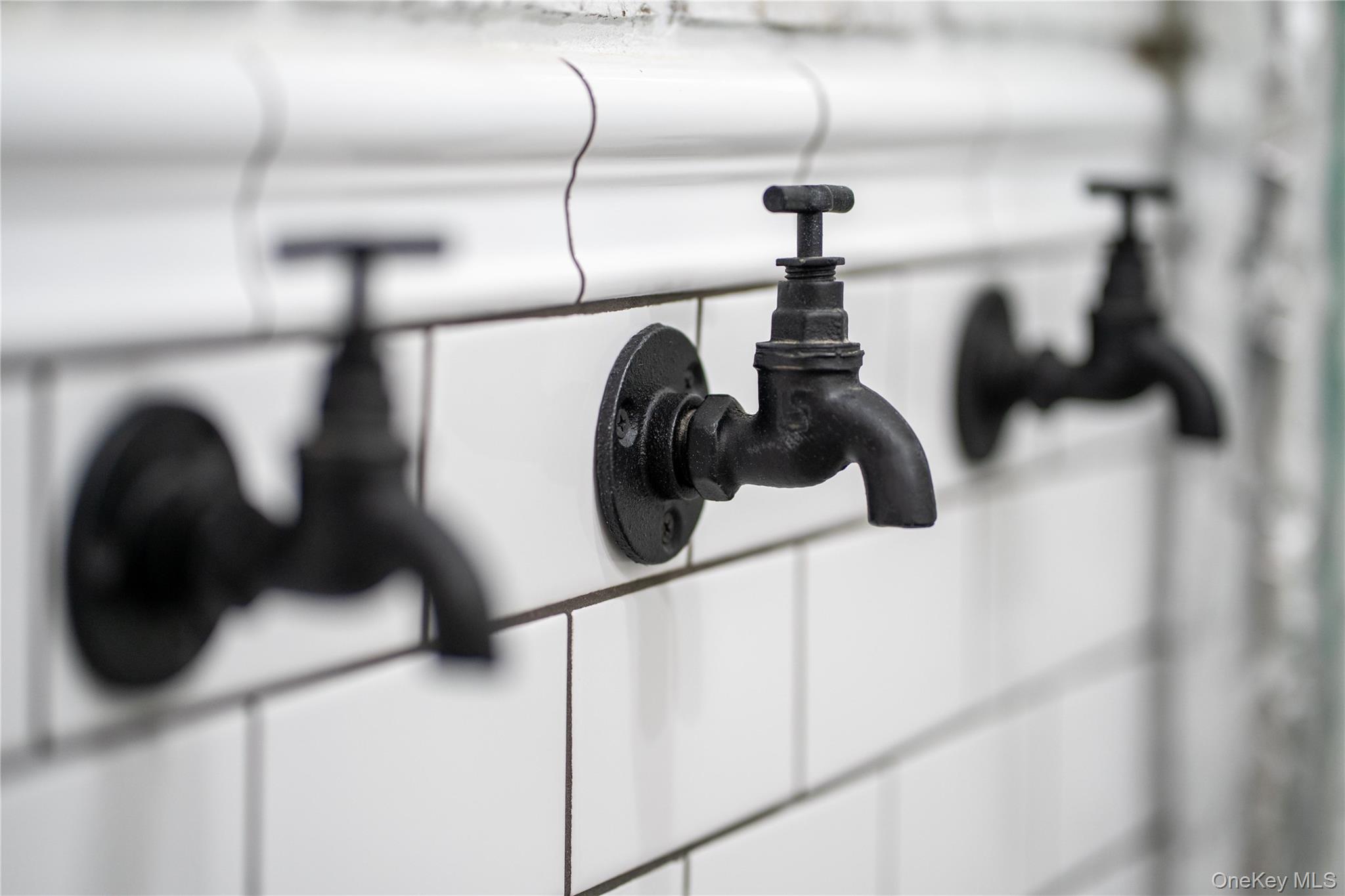 110-31 73rd Road, Unit 4N Queens, NY 11375 - Photo 12 of 15 a close view of light fixtures and racks on the wall
