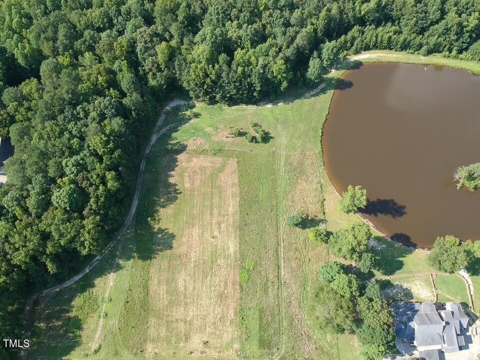 Lot 3 Wiggins Road Louisburg, NC 27549 - Photo 1 of 8 an aerial view of a residential houses with yard