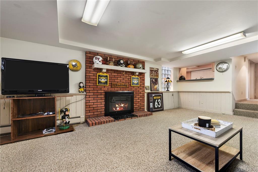 637 East McMurray Road Canonsburg, PA 15317 - Photo 34 of 50 a living room with furniture and a flat screen tv