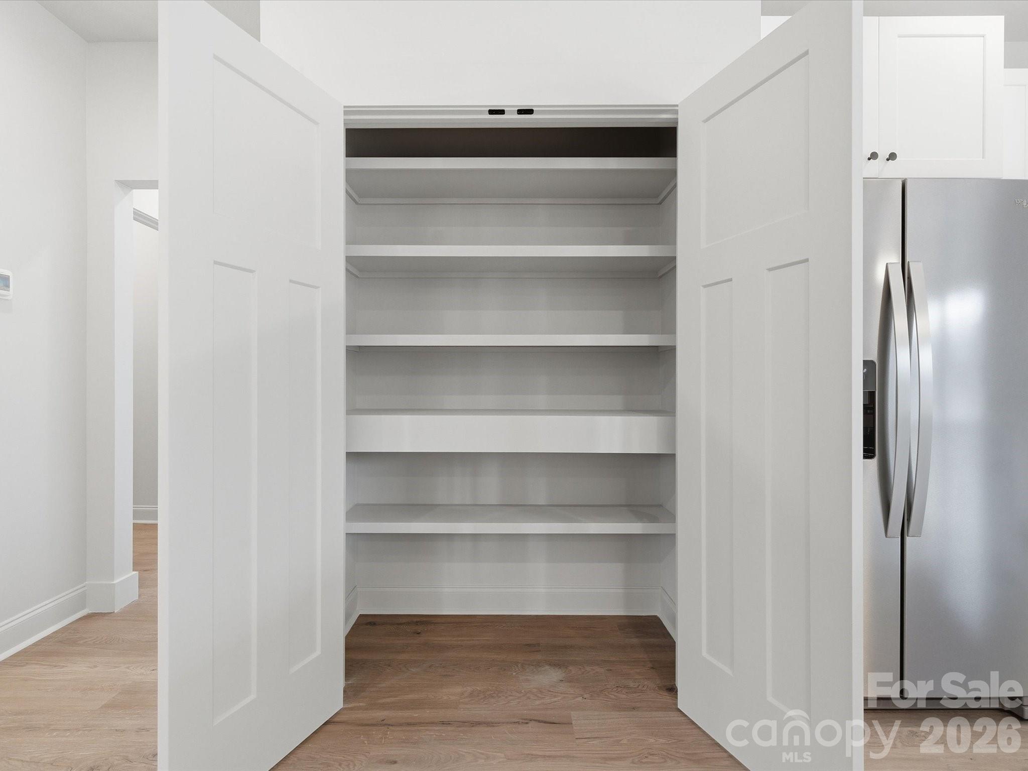 1491 Cedar Grove Road Clover, SC 29710 - Photo 12 of 48 a view of walk in closet with empty racks