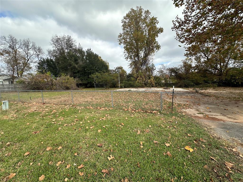 5410 Benton Road Bossier City, LA 71111 - Photo 3 of 4 a view of a field with an trees in the background