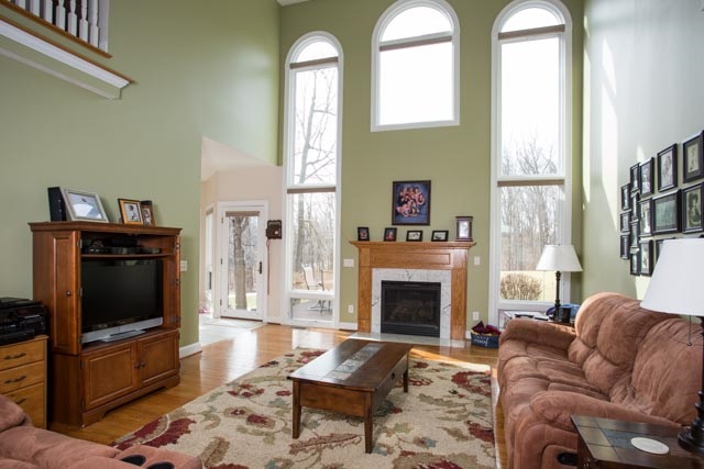 3731 Davis Road Penn Laird, VA 22846 - Photo 14 of 49 a living room with furniture a flat screen tv and a fireplace