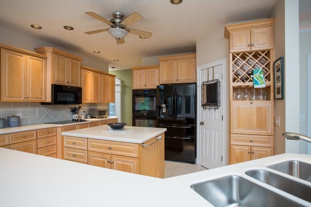 3731 Davis Road Penn Laird, VA 22846 - Photo 2 of 49 a kitchen with stainless steel appliances granite countertop a sink stove and refrigerator