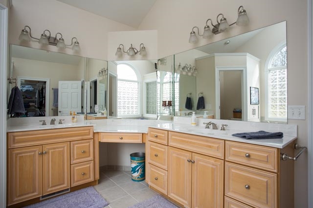 3731 Davis Road Penn Laird, VA 22846 - Photo 23 of 49 a spacious bathroom with a granite countertop sink and mirror with bathtub