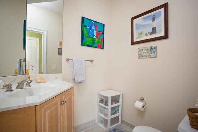 3731 Davis Road Penn Laird, VA 22846 - Photo 24 of 49 a bathroom with a sink mirror vanity and toilet