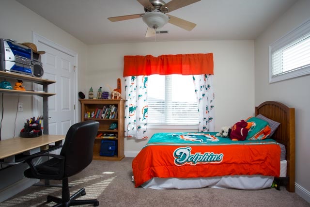 3731 Davis Road Penn Laird, VA 22846 - Photo 30 of 49 a bed sitting in a bedroom next to a window