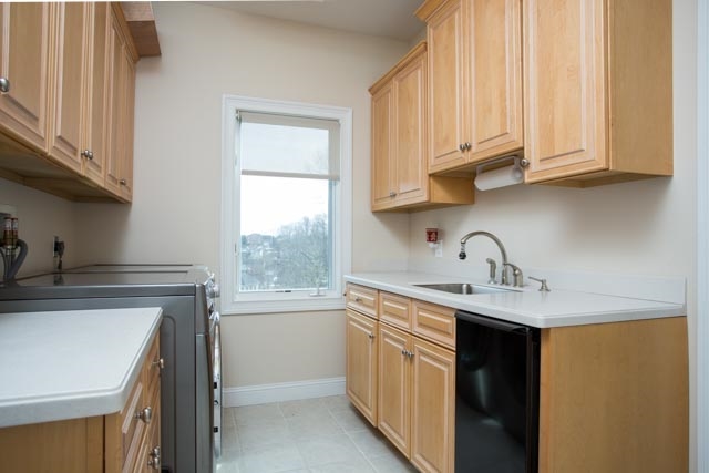 3731 Davis Road Penn Laird, VA 22846 - Photo 35 of 49 a kitchen with stainless steel appliances granite countertop a sink stove and cabinets