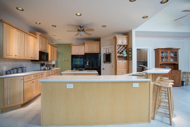 3731 Davis Road Penn Laird, VA 22846 - Photo 4 of 49 a large kitchen with stainless steel appliances granite countertop a stove and a sink