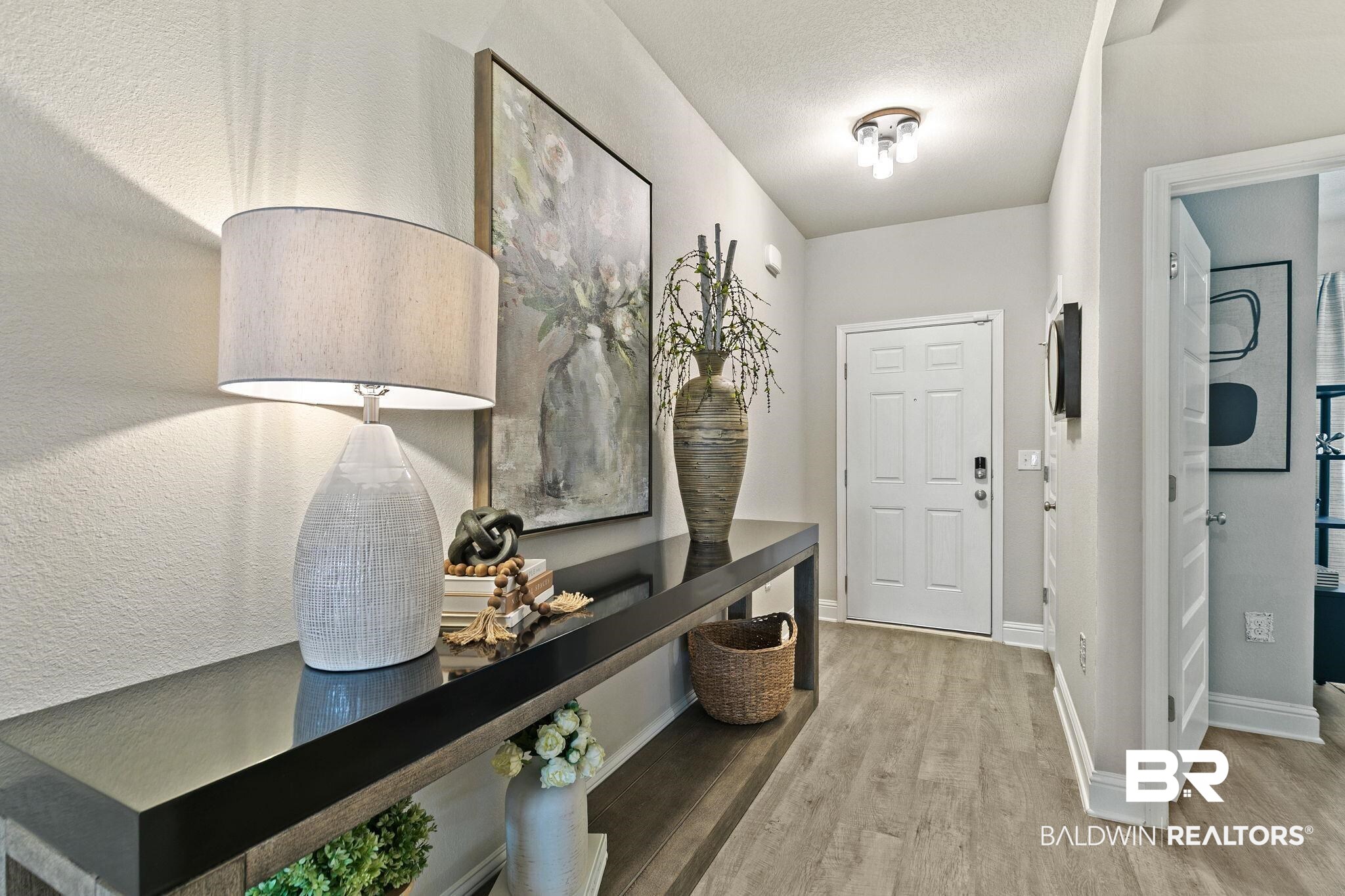 31650 Memphis Loop Daphne, AL 36527 - Photo 6 of 68 Foyer featuring light wood finished floors and a textured ceiling