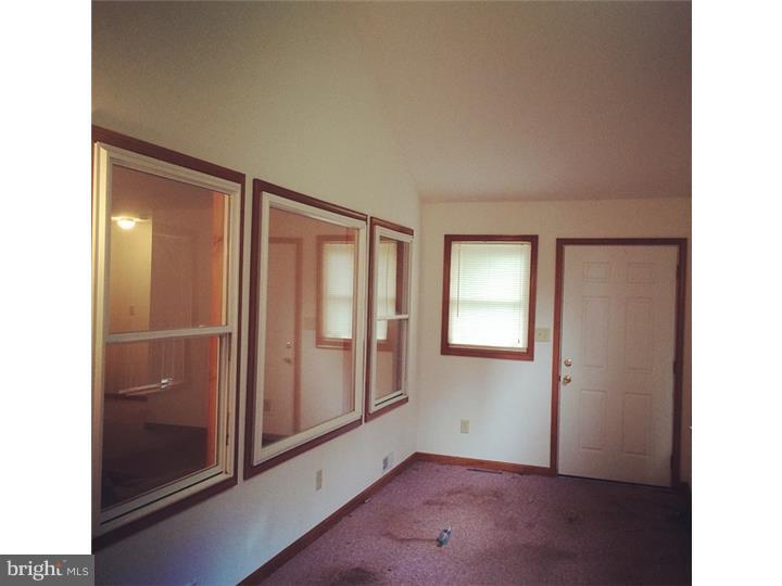 241 Weymouth Road Buena, NJ 08310 - Photo 11 of 21 a view of an empty room with window