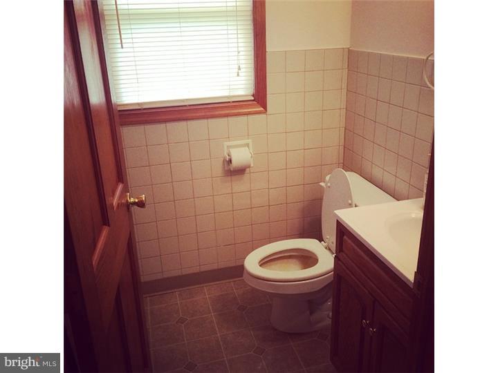241 Weymouth Road Buena, NJ 08310 - Photo 13 of 21 a bathroom with a toilet and a sink