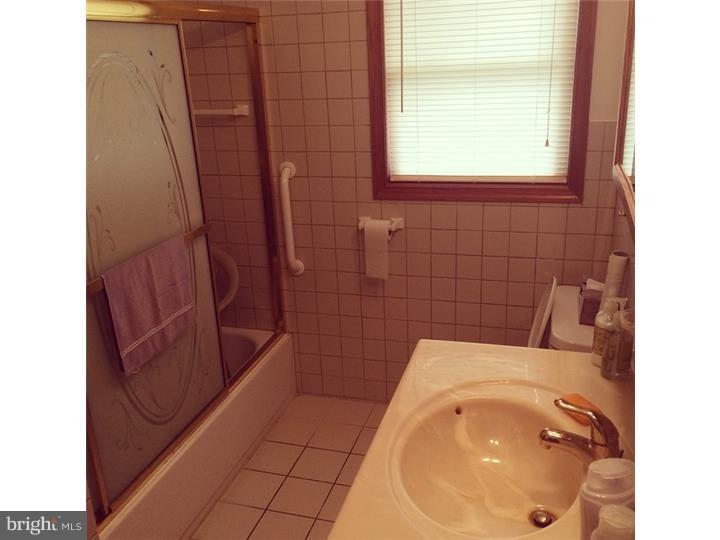 241 Weymouth Road Buena, NJ 08310 - Photo 14 of 21 a bathroom with a sink and a vanity