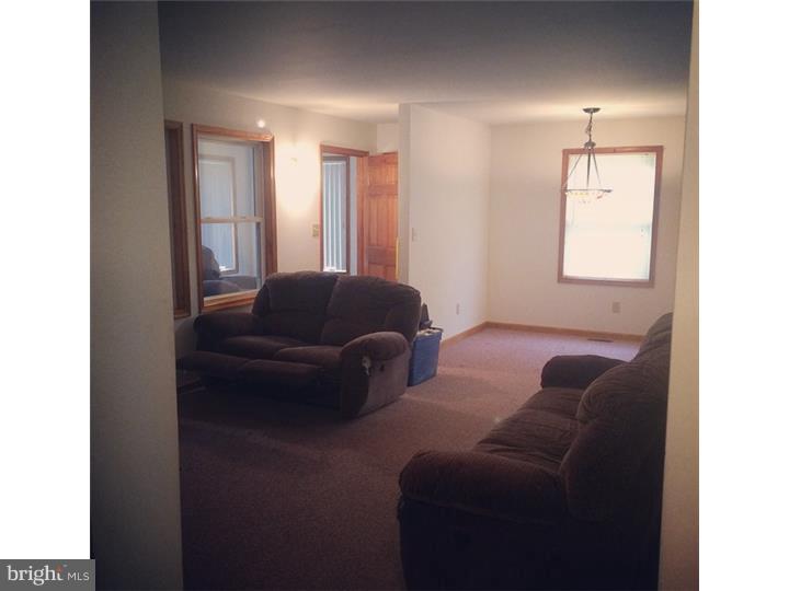 241 Weymouth Road Buena, NJ 08310 - Photo 7 of 21 a living room with furniture and a window