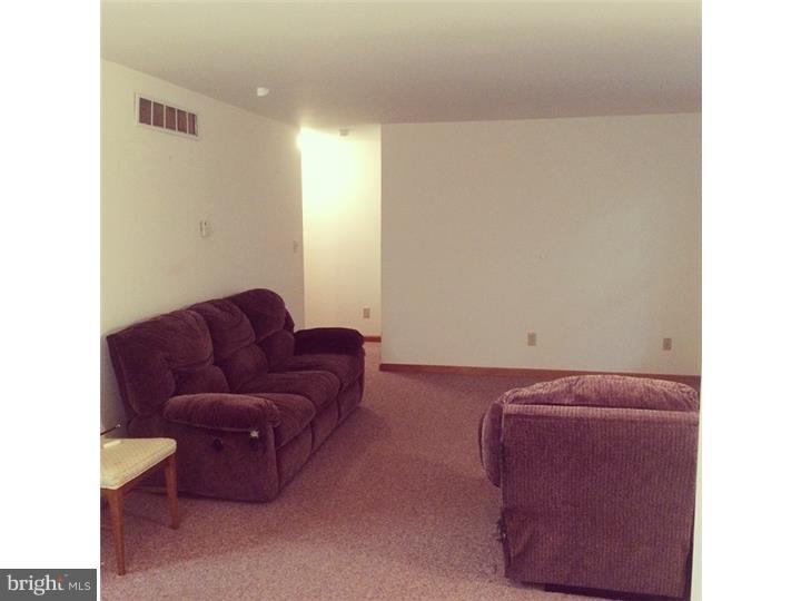 241 Weymouth Road Buena, NJ 08310 - Photo 8 of 21 a living room with furniture and a couch