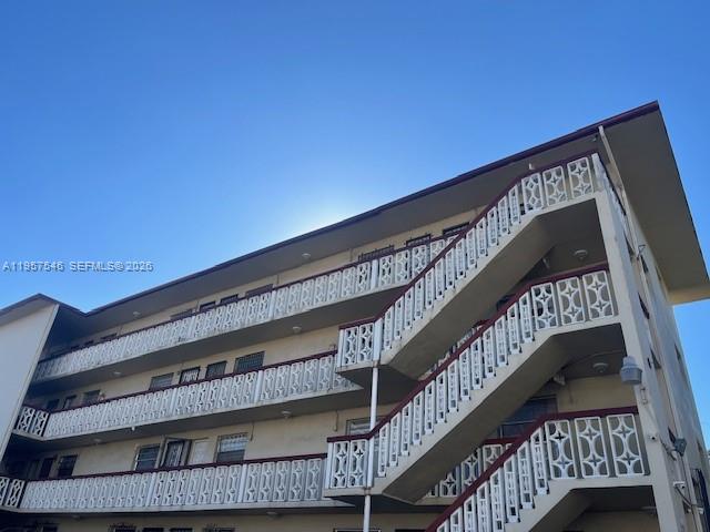 a view of balcony with wooden floor