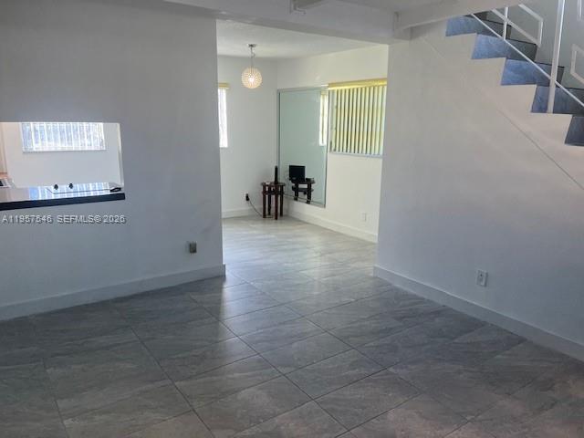 1220 Southwest 5th Street, Unit 21 Miami, FL 33135 - Photo 3 of 14 a view of a livingroom with a window