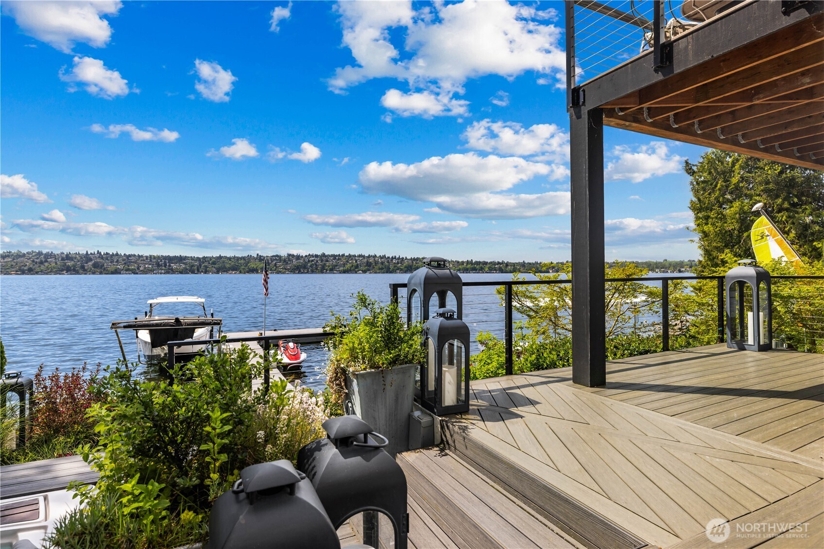 8097 West Mercer Way Mercer Island, WA 98040 - Photo 37 of 40 a view of a house with outdoor space and sitting area