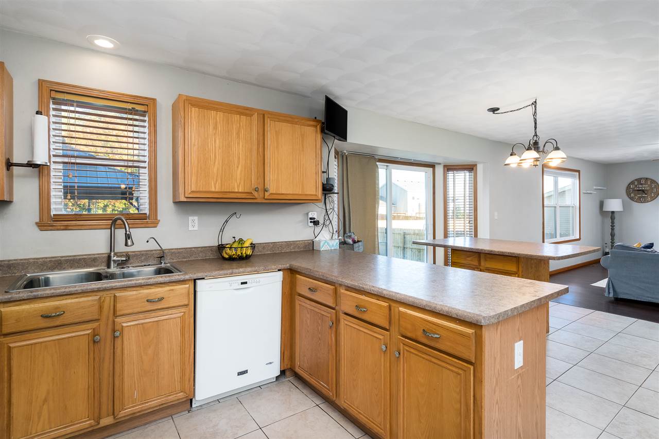 15639 Stonecrest Road South Beloit, IL 61080 - Photo 12 of 37 a kitchen with sink cabinets and window