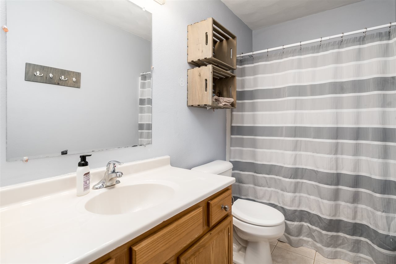 15639 Stonecrest Road South Beloit, IL 61080 - Photo 29 of 37 a bathroom with a sink and mirror