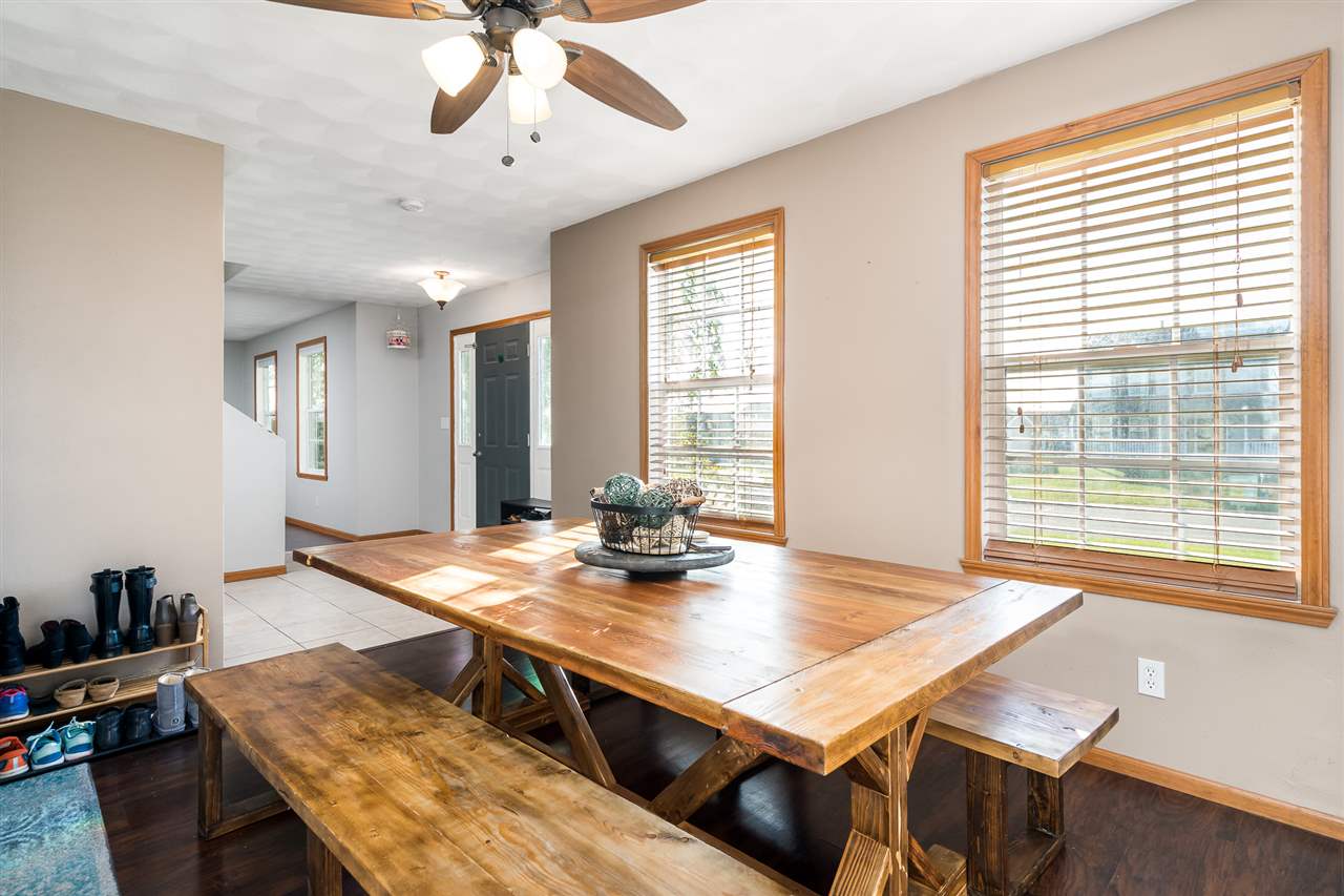 15639 Stonecrest Road South Beloit, IL 61080 - Photo 8 of 37 a view of a dining room with furniture and window