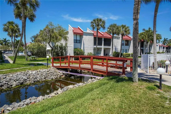 a view of a swimming pool with a house
