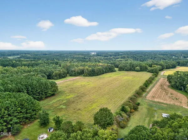 an aerial view of a house with a outdoor space