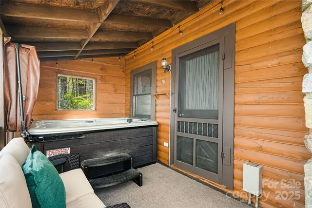 a backyard of a house with outdoor seating