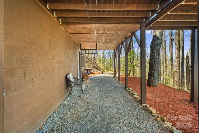 a view of front of house with large windows