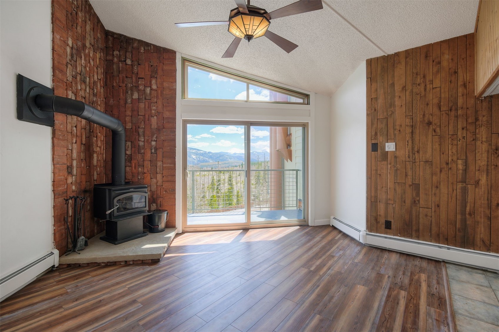 7031 Ryan Gulch Road, Unit 301 Silverthorne, CO 80498 - Photo 8 of 37 a view of an empty room with a window