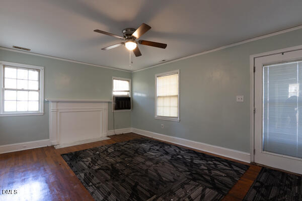 2525 Freeman Street Fayetteville, NC 28301 - Photo 11 of 24 wooden floor in an empty room with a window