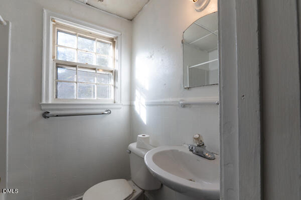 2525 Freeman Street Fayetteville, NC 28301 - Photo 20 of 24 a bathroom with a sink and a toilet