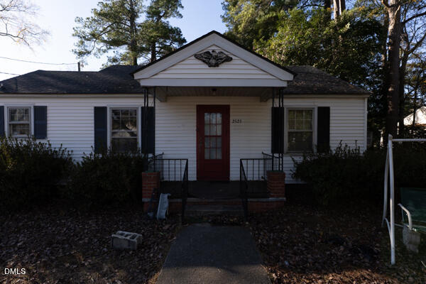 2525 Freeman Street Fayetteville, NC 28301 - Photo 2 of 24 a front view of a house with garden