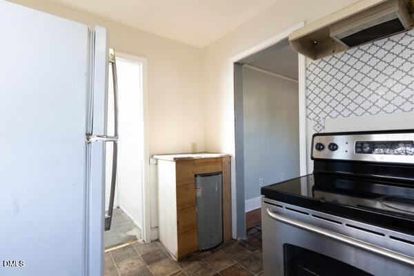 2525 Freeman Street Fayetteville, NC 28301 - Photo 6 of 24 a view of a livingroom with wooden floor and staircase