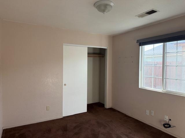 1340 Bennett Avenue Dos Palos, CA 93620 - Photo 11 of 16 an empty room with windows
