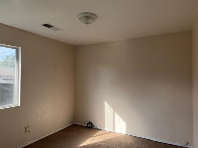 1340 Bennett Avenue Dos Palos, CA 93620 - Photo 10 of 16 a view of an empty room and a window