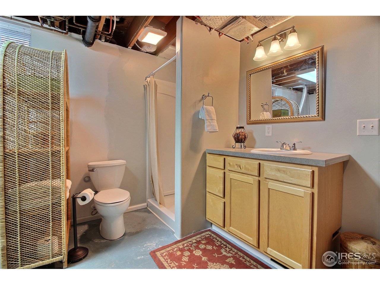 1725 Fairacres Road Greeley, CO 80631 - Photo 27 of 40 Guest Bathroom