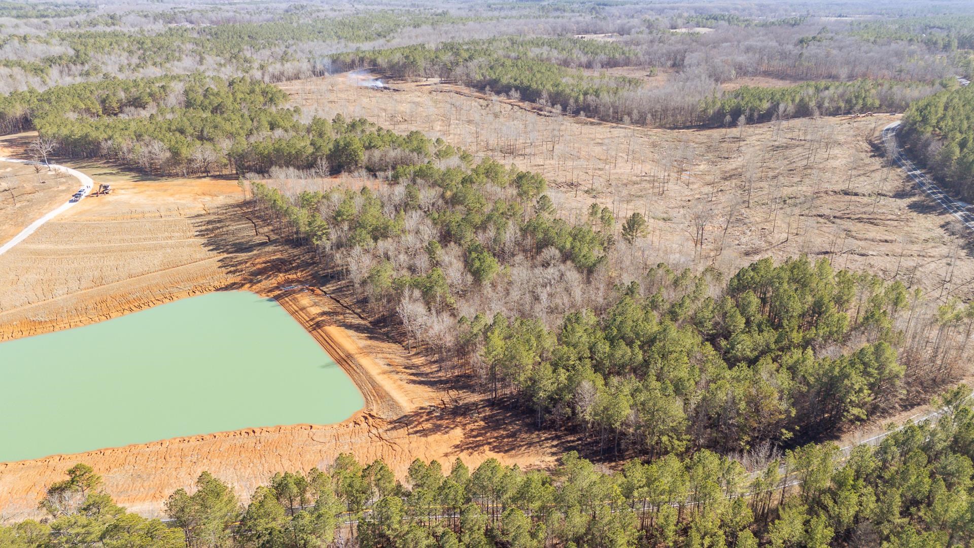 0 Kendrick & Hamburg Road Michie, TN 38357 - Photo 11 of 38 Aerial view of property's location featuring a forest and a large body of water