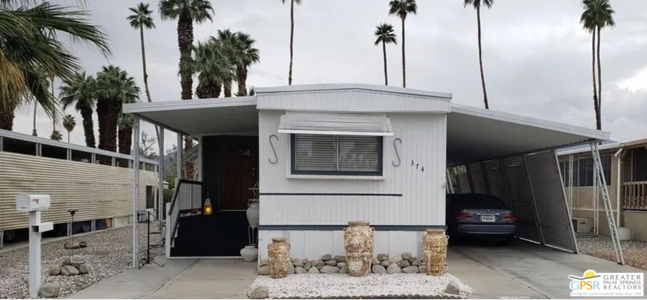 374 Buffalo Road Cathedral City, CA 92234 - Photo 1 of 33 a front view of a house with plants