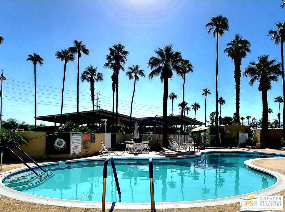 374 Buffalo Road Cathedral City, CA 92234 - Photo 28 of 33 a view of swimming pool with chairs