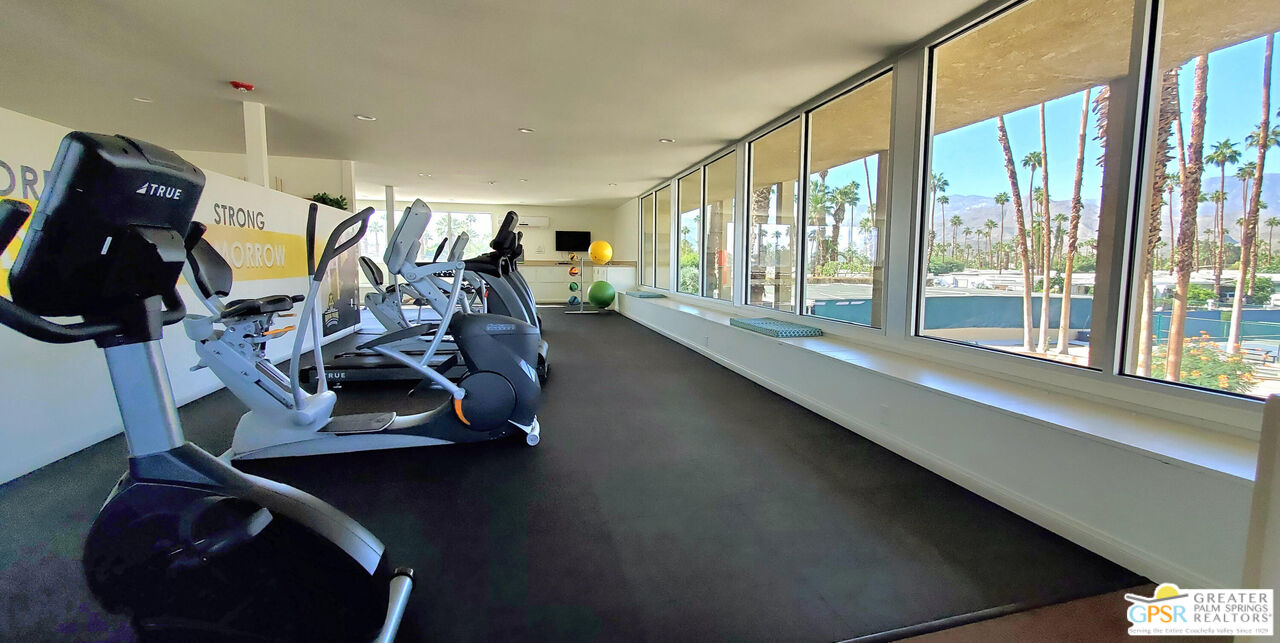 374 Buffalo Road Cathedral City, CA 92234 - Photo 29 of 33 a view of a room with gym equipment