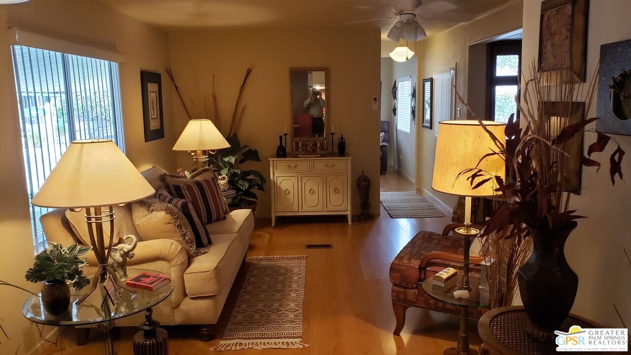 374 Buffalo Road Cathedral City, CA 92234 - Photo 7 of 33 a view of a room with gym equipment