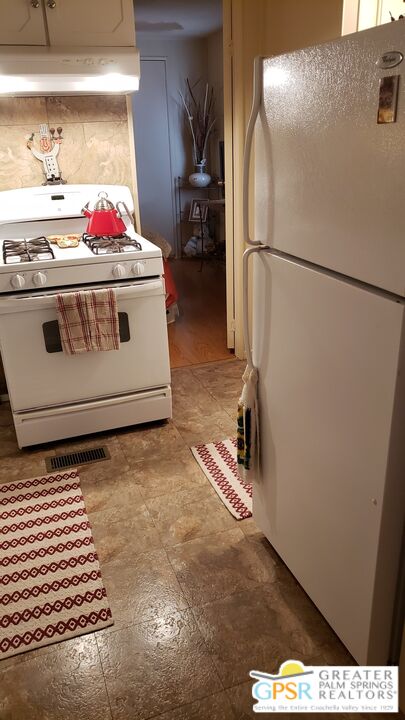374 Buffalo Road Cathedral City, CA 92234 - Photo 10 of 33 a utility room with dryer and washer