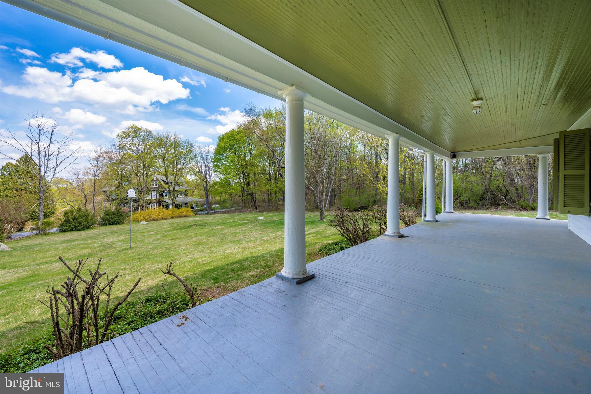 5816 Rowland Road Cascade, MD 21719 - Photo 2 of 74 Super deep porch to enjoy the views