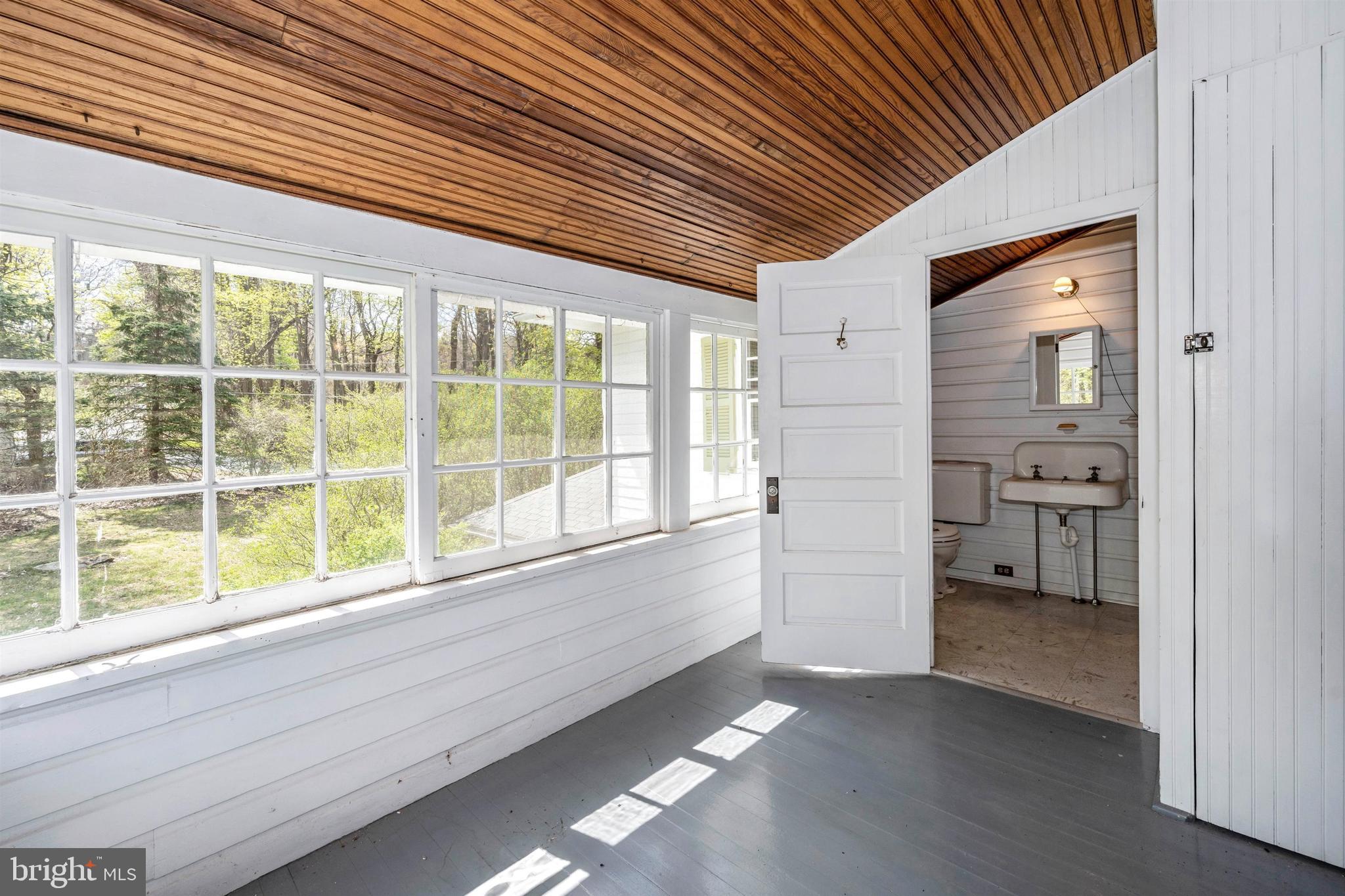 5816 Rowland Road Cascade, MD 21719 - Photo 25 of 74 Enclosed porch and full bath